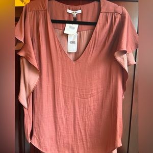 Naked Zebra blouse with flutter sleeves. Size large, new with tags - never worn.